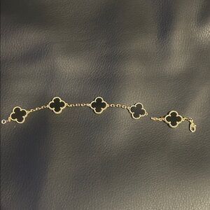 Van Cleef & Arpels Gold and Black Clover Bracelet